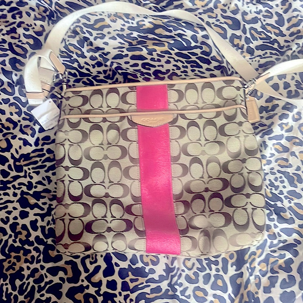 Coach crossbody purse. Never used. Original tags attached.